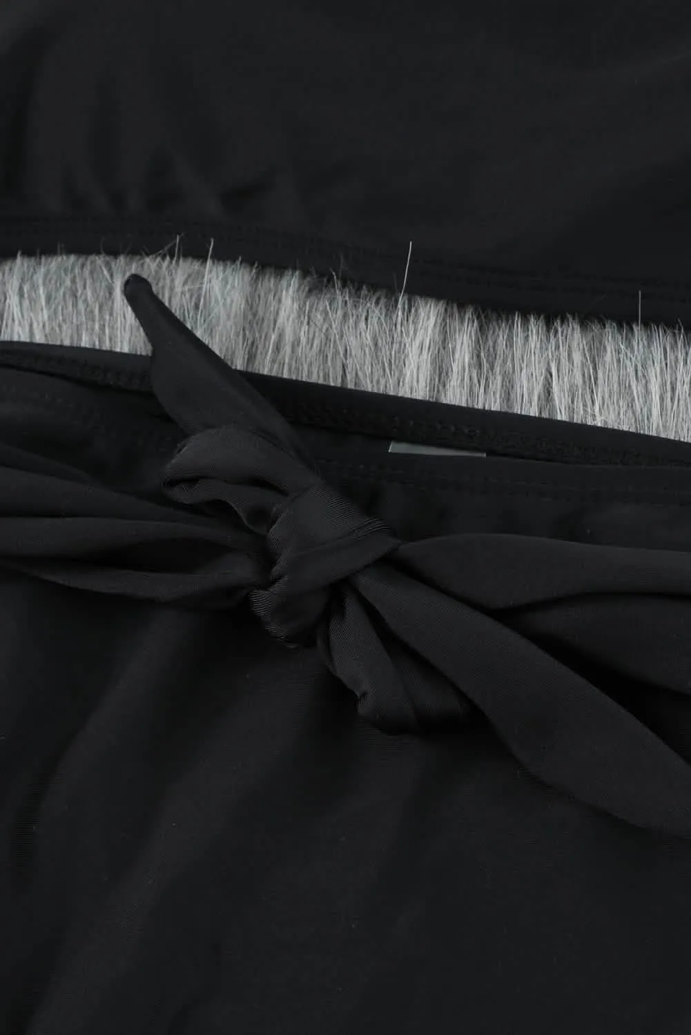 Sophisticated Black High-Waisted Bikini with Romantic Puff Sleeves and Distinctive U-Back Design